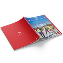 A red brochure is open, displaying a colorful cover image of people in safety gear.