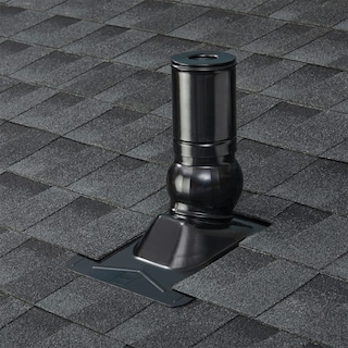 A black cylindrical roof vent installed on a gray shingled roof.